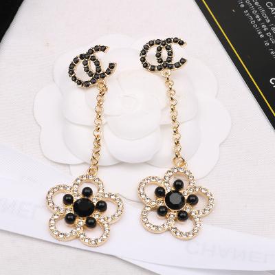 China Small Silver Perfume Fashion Needle Letter Earring Pearl Brand Designer Earring Female New Simple Long 925 TRENDY for sale