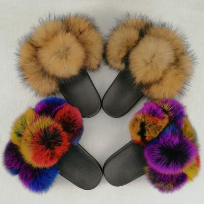 China Fashion Trend New Design Big Raccoon Fur Ball Indoor Fur Slippers Women's Cute Fluffy Pompom Real Fox Fur Slippers For Women for sale