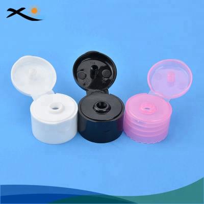 China Non Spill Cosmetic Plastic Bottle 100ml Snap Top Cap 28mm Soft Top Cap Flip Top Cap for sale