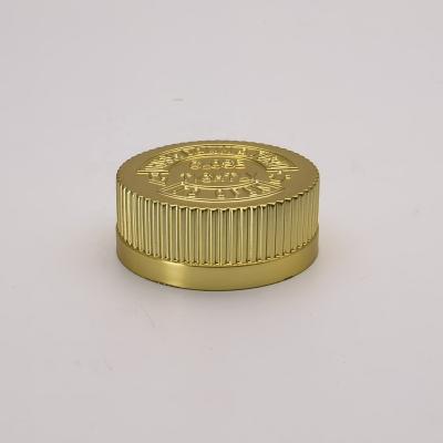 China Non Spill Electroplating Treatment 38 Mm Medicine Hat 38/400 Gold Child Safety Cap for sale