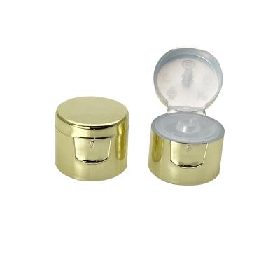 China Bottles Plated 20 Mm Plastic Gold Flip Up Cap PP Plastic Cosmetic Flip Top Cap for sale