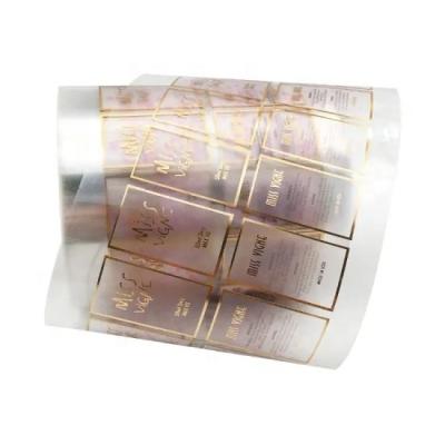 China Custom Printing Self Adhesive Roll Waterproof LOGO Label Transparent Clear Gold Foil Sticker for sale