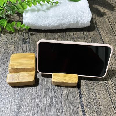 China PORTABLE Custom Universal Bamboo Mobile Phone Stand Wooden Cell Phone Stand for sale