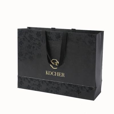 China Recyclable Luxury Gift Paper Bag Custom Printed Logo Jewelry Packaging Kraft Shopping Paper Bag for sale