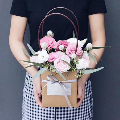 China 2022 Recycled Materials Valentine Day Portable Flower Box Packing Basket Wedding Gifts Folding Paper Flower Box for sale