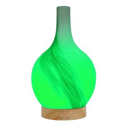 China Household Humidifier Aromatherapy Dixit Ultrasonic Diffusers With Colored Glass Night Light for sale