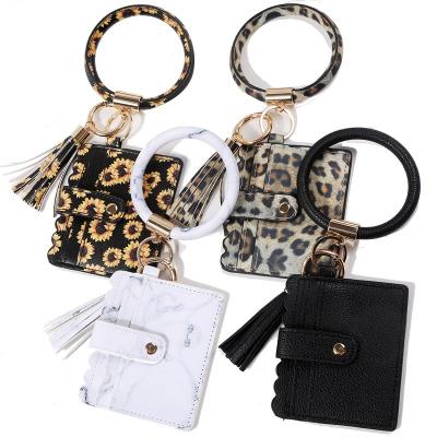 China Snakeskin Pattern PU Key Chain Ring Wristband Bracelets Card Holder Keychain Leather Wristband For Girls for sale