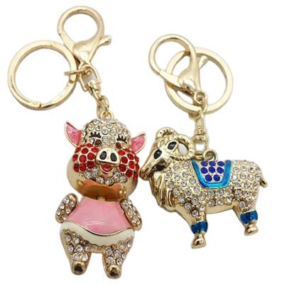 China Hot Selling Customized Promotion Style Cute Animal Diamond Metal Pig Key Chain for sale