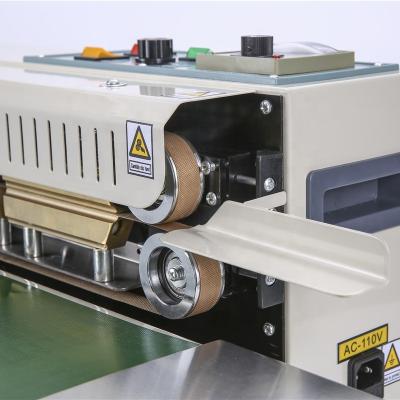 China FRD-900 GARMENT Continuous Tape Sealer Bag Sealing Machine for sale