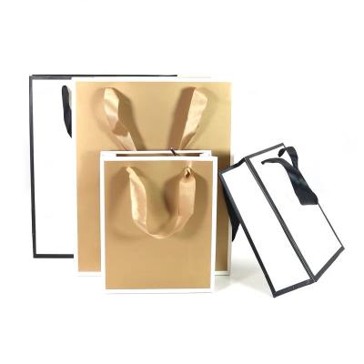 China Recyclable Hot sales eco friendly twist kraft paper bag custom logo gift food take away kraft paper shopping bag for sale