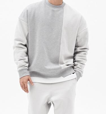 China Hot Selling Patchwork Men's Drop Shoulder Anti-wrinkle Solid Color Hoodie Loosely Fit Crewneck Mens Sweatshirts for sale