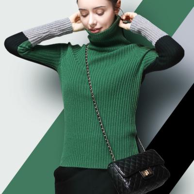 China Anti-wrinkle high neck neck color blocking cashmere wool contrast color black and green sweater for women for sale