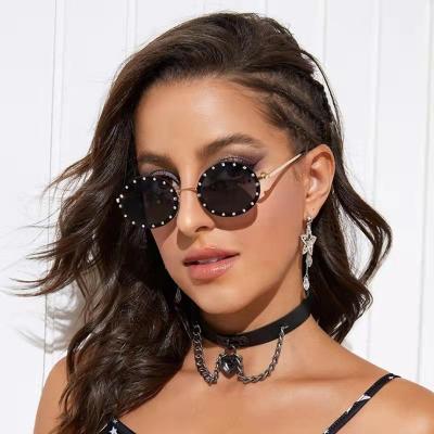 China Fashion sunglasses sell well new type rhinestone oval sunglasses around designer Sunglasses for sale