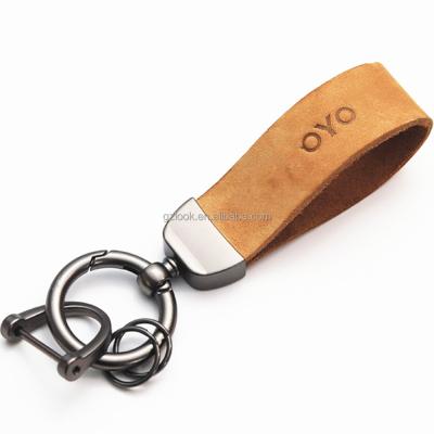 China New Style Eco-friendly Brown Whip Sweat Proof Car Key Chains Emblem Custom Logo for sale