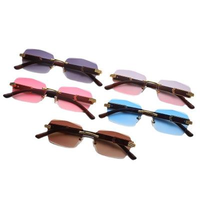 China New Fashion Sun Glasses Sunglasses with Wood Grain Diamond Cut Sunglasses Rimless Square Metal Temples Sun Ladies Wood Lenses for sale