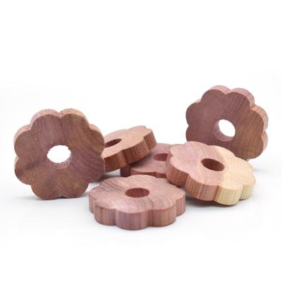 China China Wholesale Cedar Rings Clothes Pad Block Plum Blossom Shaper Cedar Wood For Clothes Storage for sale