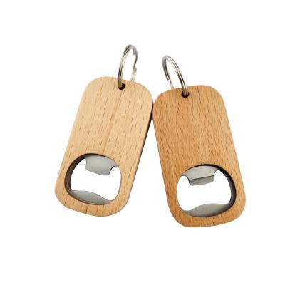 China Custom Wholesale Portable Bulk White Logo Key Chain Opener Wooden Beer Bottle Opener With Eco-Friendly for sale