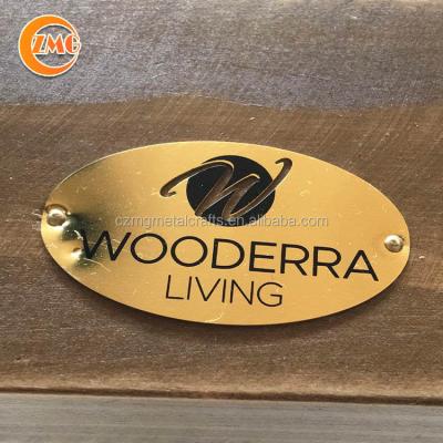 China Europe wholesale high quality custom printed oval two hole metal logo label for wooden furniture for sale