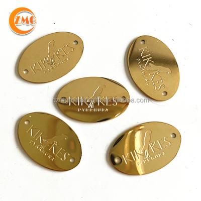 China Europe Wholesale High Quality Shiny Gold Custom Engraving Oval Small Shape Personalized Metal Labels For Clothes for sale