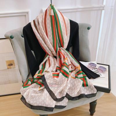 China Fashion Letter Scarf Spring Silk Shawl And Autumn Fashion Scarf for sale