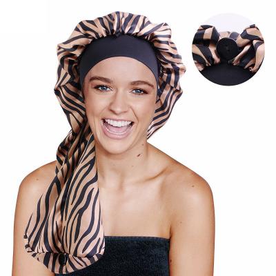 China Picture Fashion Zebra Wide Band Satin Braid Ladies Long Sleep Hats Designer Beanies Women With Snap for sale