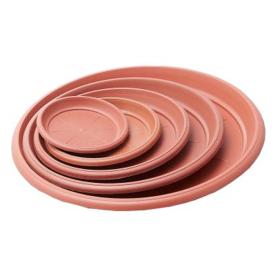 China Wholesales 12inch Brown Round Flower Pot PP Modern Plastic Saucer Planter Round Trays With Wheel For Gardening for sale