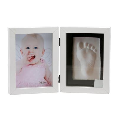 China Eco-Freindly Baby Handprint and Clay Newborn Baby Clay Footprint Photo Frame for Kids Gift for sale