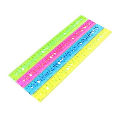 China 30cm Scale Eco-friendly Plastic Colorful Straight Ruler 12inch Transparent Colorful Alphabet Stencil Drawing Plastic Ruler for sale