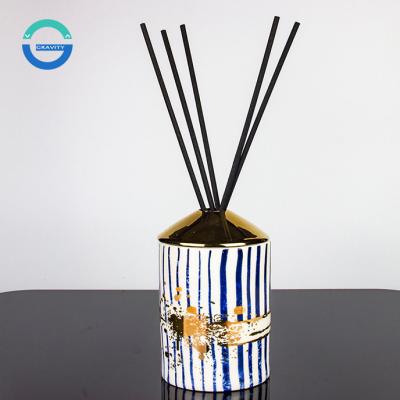 China Viable Private Rattan Label Essential Oil Bottle 100ml Coin Spray Ceramic Reed Diffuser Bottle for sale