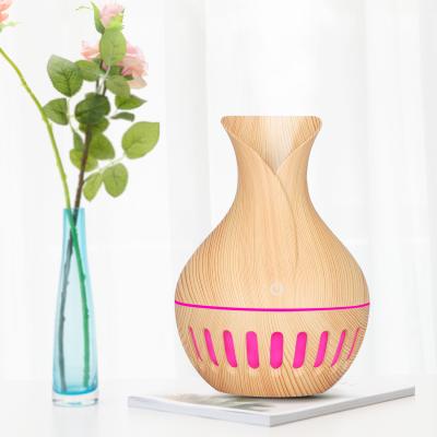 China Portable Wood Grain 130ml Warm Cool Ultrasonic Aroma Humidifier Bottle Heater Aroma Diffuser Water Usb Car For Kids for sale