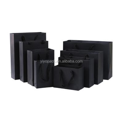 China Recyclable Luxury Fancy Paper Custom Kraft Paper Shopping Bag With Ribbon Handle for sale