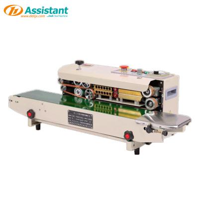 China FR-900 Sealing Imprint Integration Sealing Machine for Film Continuous Rice Bag Sealing for sale