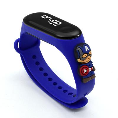 China Hot Selling Day/Date Superman Wristband Watch LED Cartoon Superman Kids Electronic Watch Swimming Waterproof Watch for sale