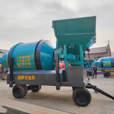 China 1000L Self Loading Concrete Mixer Twin Shaft Concrete Mixer Green for sale