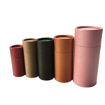 China Recyclable customize craft paper tube packaging 1oz 2oz size tea size logo black round tube box amber custom cardboard tube for sale