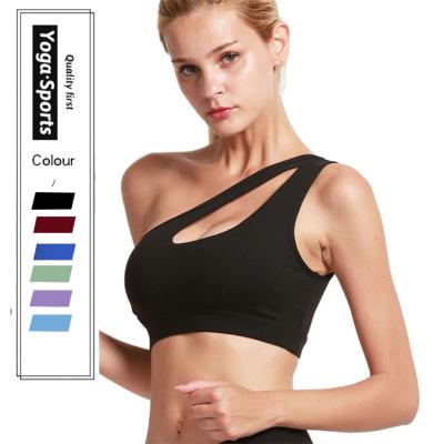 China Breathable Quick Dry High Impact One Shoulder Sports Bra Hollow Top Yoga Bra For Women for sale