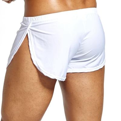 China JOCKMAIL Antibacterial Men Yoga Briefs Loose Shorts Plus Size Male Underwear 100% Polyester Breathable Split Boxer Briefs Pure Color Trunks for sale