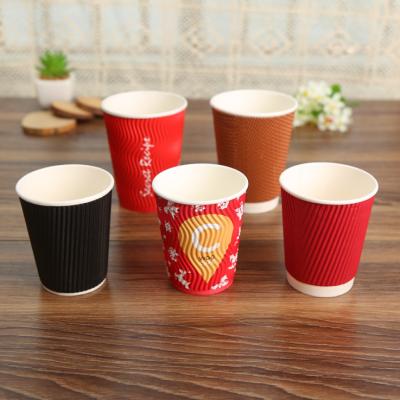 China Recyclable Custom Printed Ripple Coffee Disposable Corrugated Paper Cup With Lids for sale