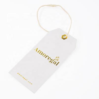 China Recyled Custom Own Logo Luxury Embossed Paper Hangtag For Clothing Shoes Gift Swing Hang Tags for sale