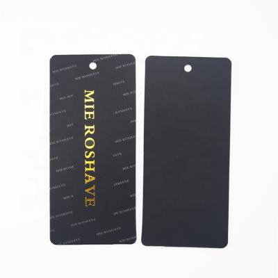 China Custom Brand Logo Garment Embossed Paper Hangtag from Recyled for Clothing Shoes Gift Swing Hang Tags for sale