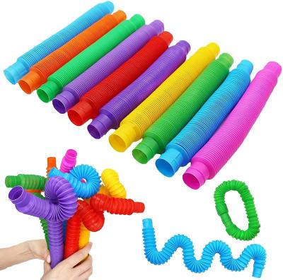 China Wholesale MINI Colorful DIY Eco-friendly Material Pop Tube Stir Toy Pop Tubes Pipe Sensory Toys For Kids Stretch for sale