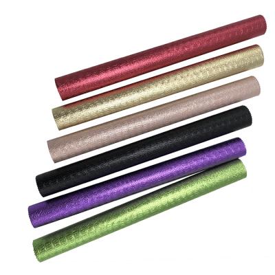 China Waterproof factory directly sell high quality gift wrap laminated embossed texture coated unwoven fabrics for sale