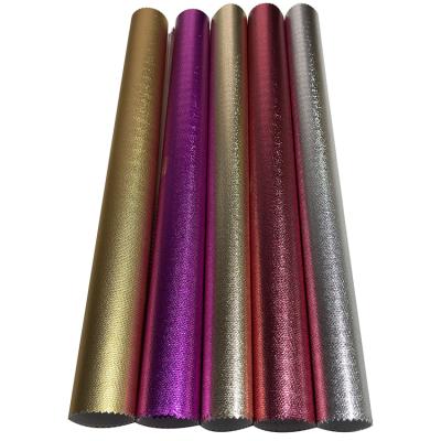 China Best selling factory supply waterproof laminated texture embossed metallic non woven fabrics for gift wrapping for sale