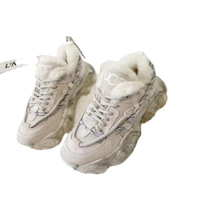 China Fashion trend designer's winter padded wool shoes with thick soles and wool integrated ladies' sports casual shoes for sale