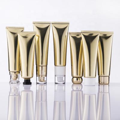 China Stock 50ml Luxury Gold Laminated Aluminum Cream Cream Packaging Tube Tube With Different Lids Pump for sale