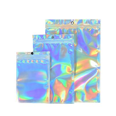 China Iridescent Moisture Proof Rainbow Zipper Lock Bags Hologram Cosmetic Plastic Zipper Makeup Laser Holographic Bags for sale