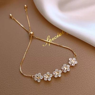 China Hot-selling Lead Free And Nickel Free Style Micro-inlaid Zircon Flower Adjustable Bracelet for sale