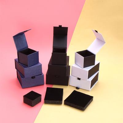 China Newest Fsahion Magnet Jewelry Packaging Ring Box White Black Customized Handmade Sponge Inside Jewelry Box for sale