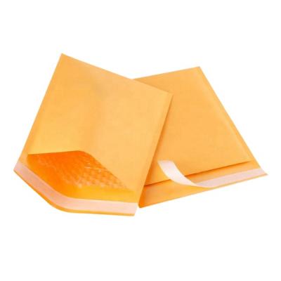 China Stock Design Biodegradable Eco-friendly Kraft Yellow Bubble Mailers Custom 8x4 Paper Bubble Envelope Mail Bag for sale