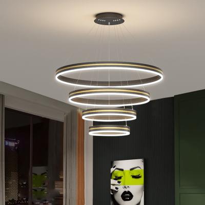 China Unique modern simple shape +high grade LED decorative living room hanging black iron circle acrylic rings led chandeliers for sale